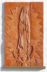 Life-size ceramic tile plaque of Our Lady of Guadalupe on the grounds of the Guadalupe Center in Cuernavaca, Mexico.